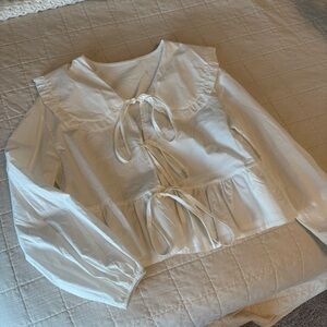 Elegant Cream Blouse with Ruffle Details